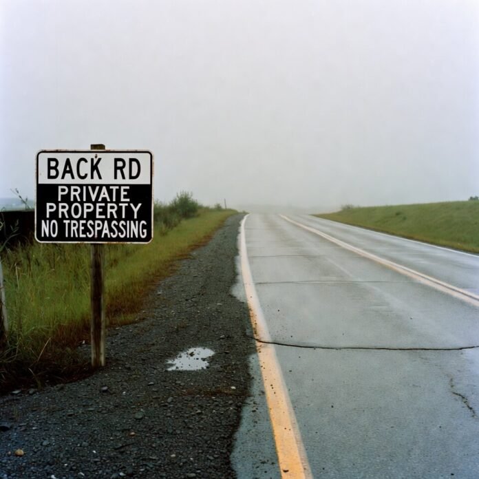 Grainy warehouse timeclock showing overtime hours and tariff warning note