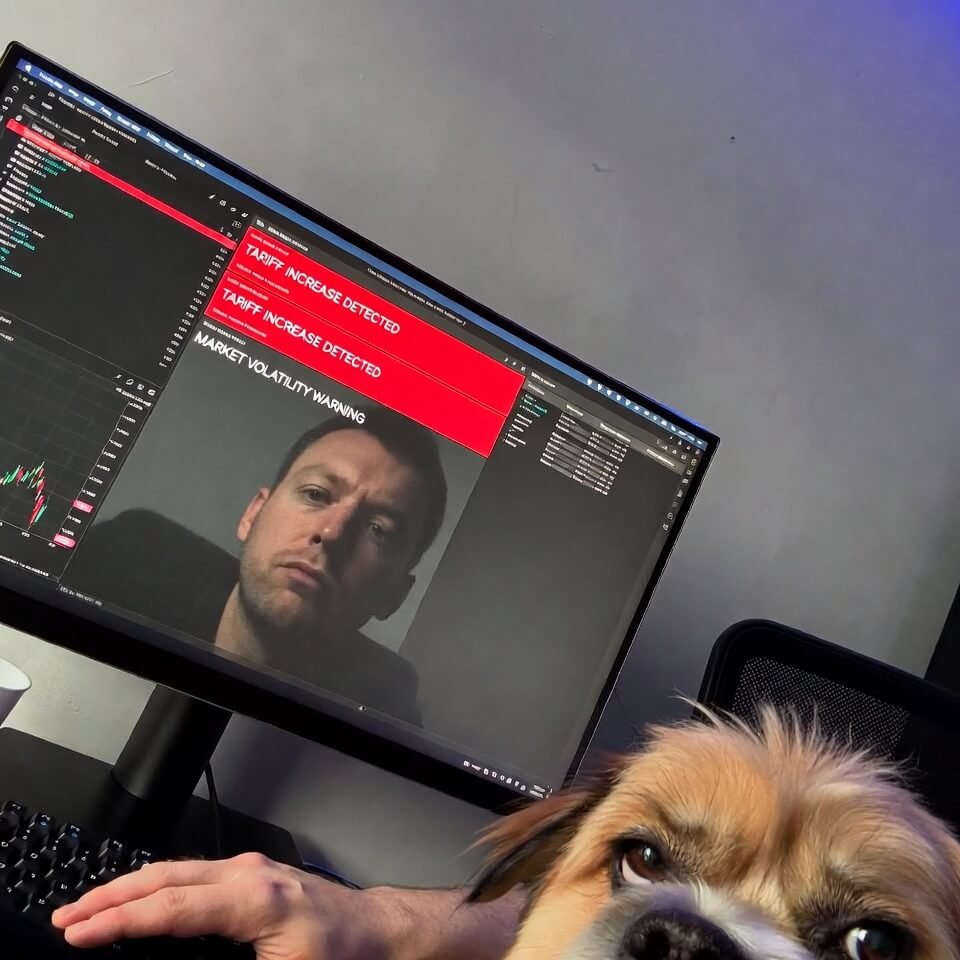 Trading monitor selfie with confused dog photobomb